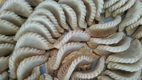 Exquisite Moroccan Pastries Displayed Elegantly wallpaper