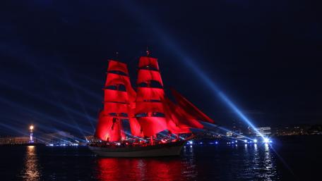 Sailing into the Night Under Crimson Sails wallpaper
