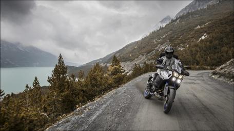 Adventurous Ride Through Scenic Mountains wallpaper