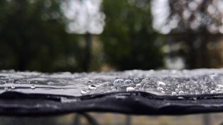 Raindrops on an Umbrella Surface in Nature wallpaper