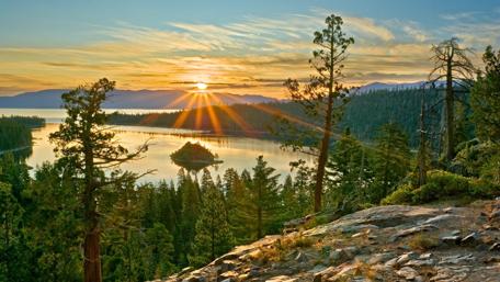 Serene Sunrise Over Tranquil Lake Scene wallpaper