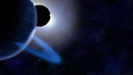 Cosmic Dance of Rings and Moons wallpaper