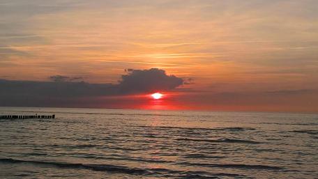 Serene Sunset Over the East Sea wallpaper