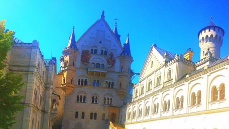 Majestic Neuschwanstein Castle Under Clear Skies wallpaper