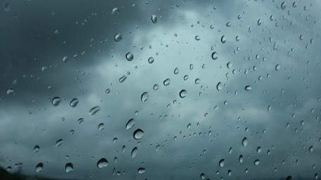 Raindrops Against a Moody Sky wallpaper