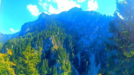Majestic Mountain Scenery in Vibrant Blue Sky wallpaper