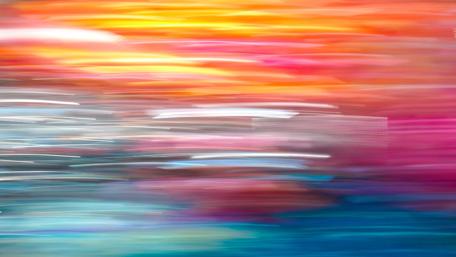 Vibrant Swirls of Colorful Movement wallpaper