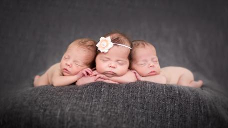 Three Adorable Sleeping Babies in Harmony wallpaper