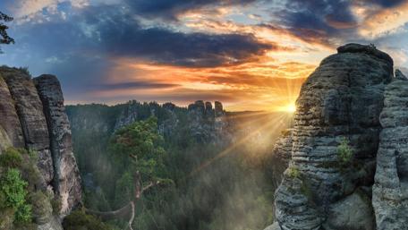 Sunlit Cliffs and Sky Symphony wallpaper