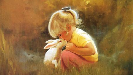 A Tender Moment Between Child and Rabbit wallpaper