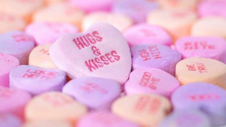 Sweet Kisses and Hugs Candy Wallpaper wallpaper