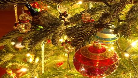 Festive Ornaments on a Christmas Tree wallpaper