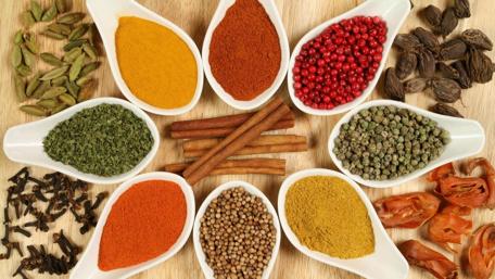 Vibrant Array of Spices and Herbs for Culinary Inspiration wallpaper