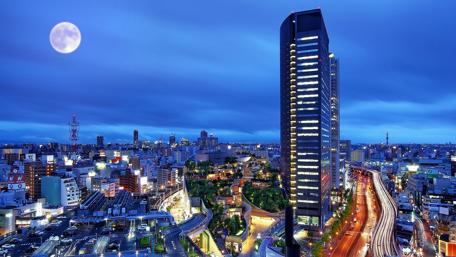 Moonlit Cityscape at Night wallpaper
