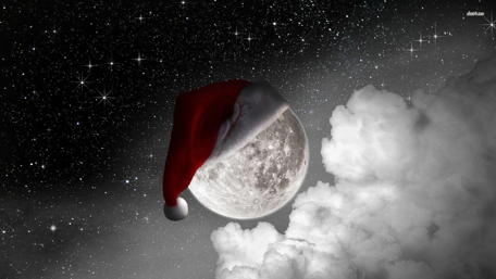 Santa Hat on the Moon Amidst Starry Sky wallpaper