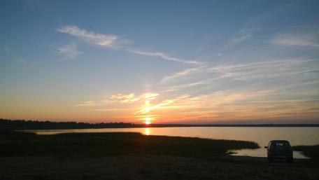 Serene Sunset Over Tranquil Waters wallpaper