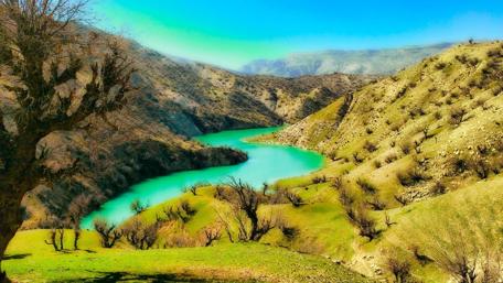 Serene River Winding Through Nature's Embrace wallpaper