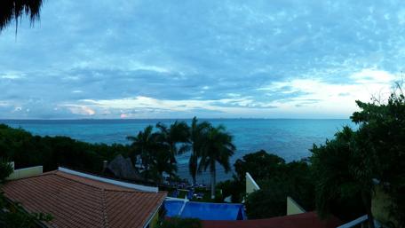 Serene Balcony View Overlooking Cancun's Turquoise Waters wallpaper