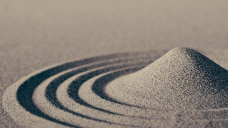Nature's Circular Sand Patterns Inspiring Calmness and Serenity wallpaper