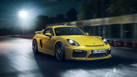 Vibrant Yellow Sports Car in Motion wallpaper