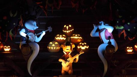 Spooky Celebration with Musical Ghosts and Pumpkins wallpaper