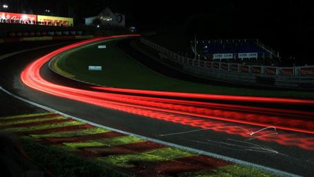 Racing Night Lights Captured in Motion wallpaper