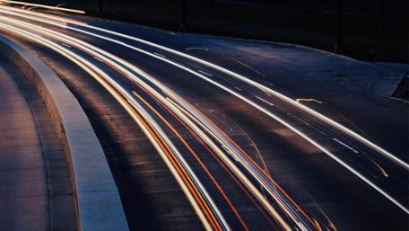 Dynamic Night Lights Capturing Life's Motion wallpaper