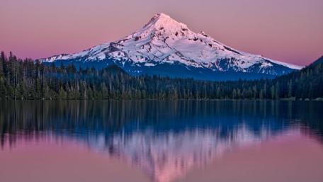 Majestic Purple Dawn at Snowy Mountain Peak wallpaper