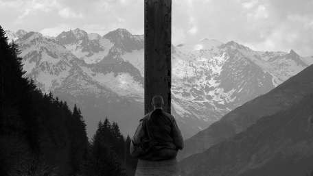 Silent Reflection Amidst Majestic Peaks wallpaper