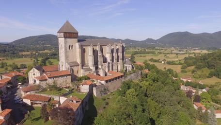 Majestic Saint Bertrand Surrounded by Nature's Beauty wallpaper