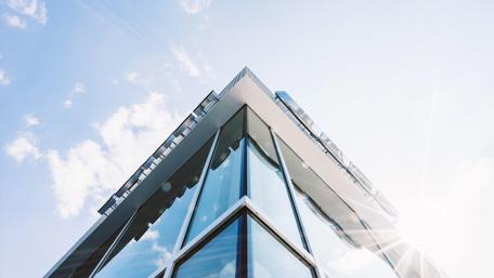 Modern Urban Architecture with Clear Skies wallpaper