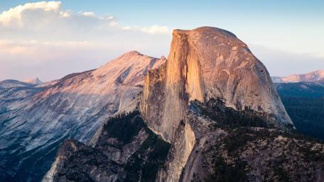 Majestic Mountain Peaks and Rugged Cliffs wallpaper
