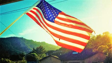 Waving Freedom in the Sunset wallpaper