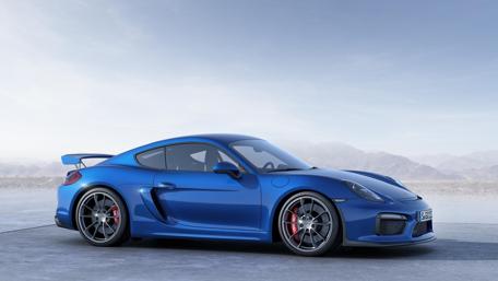 Sleek Blue Sports Car on Open Road wallpaper