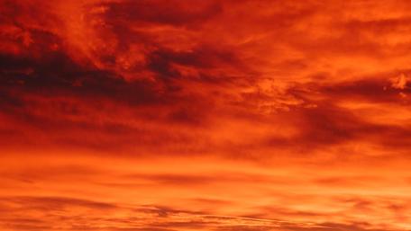 Fiery Red Sky Over Nature's Canvas wallpaper