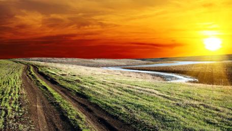 Vibrant Sunset Over Serene Landscape wallpaper