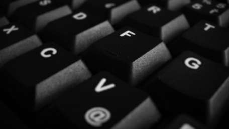 Sleek Black and White Keyboard Close-Up Wallpaper wallpaper