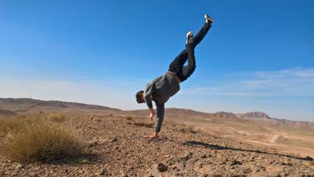 Dynamic Bboy Handstand in Nature's Embrace wallpaper