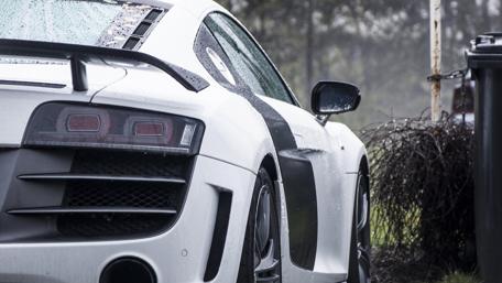 Sleek Audi R8 in Rainy Setting wallpaper