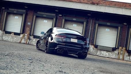 Sleek Audi RS5 Captured in Urban Setting wallpaper