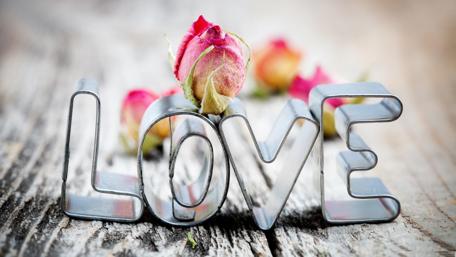 Whispers of Romance with Roses and Love wallpaper
