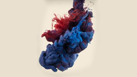 Vibrant Swirls of Ink in Motion wallpaper