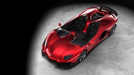 Sleek Red Lamborghini in Stylish Setting wallpaper