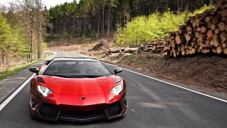 Red Lamborghini on a Scenic Drive wallpaper