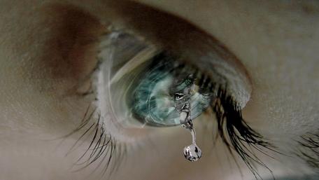 Reflective Tear on the Brink of Release wallpaper