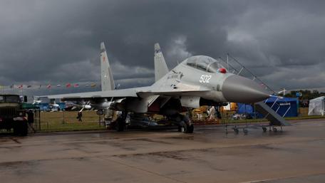Military Aircraft Showcase Under Brooding Skies wallpaper