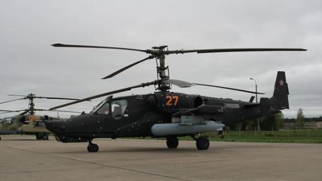 Combat-Ready Helicopter in Action wallpaper