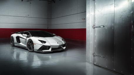 Lamborghini Aventador in a Sleek, Modern Warehouse Setting wallpaper