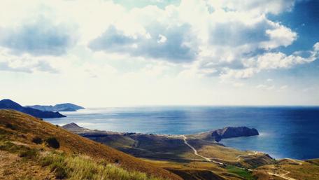 Breathtaking Crimea Sea View Amidst Summer Clouds wallpaper