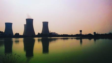 Industrial Symmetry by the Water wallpaper
